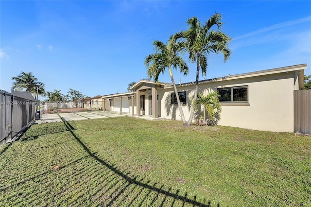 view of yard with a garage