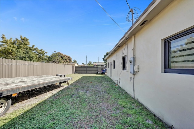 view of yard with a deck