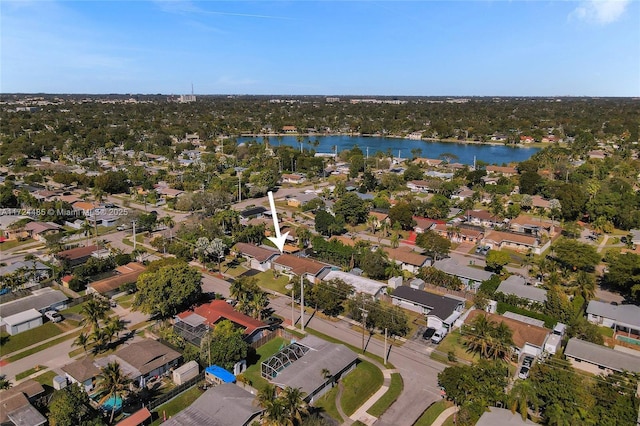 drone / aerial view with a water view