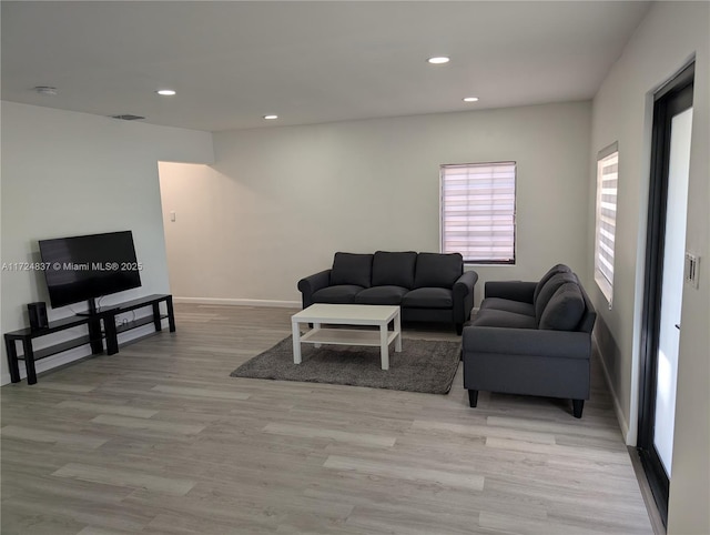 living room featuring light wood-type flooring