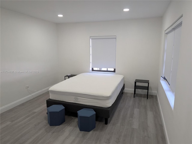 bedroom featuring hardwood / wood-style flooring