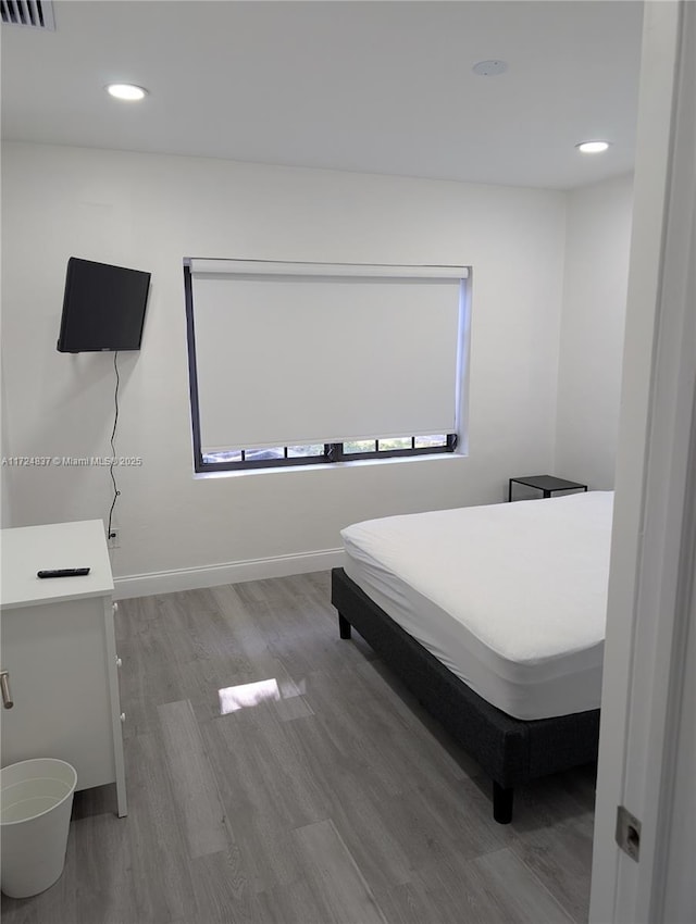 bedroom featuring light wood-type flooring