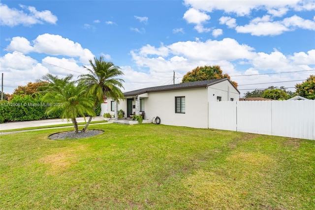 exterior space with a lawn