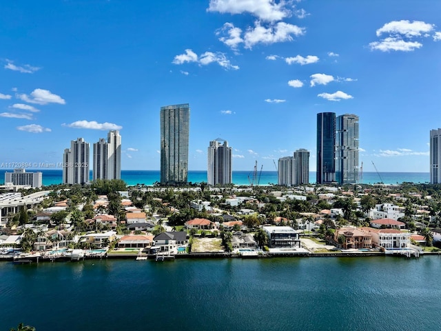 property's view of city with a water view