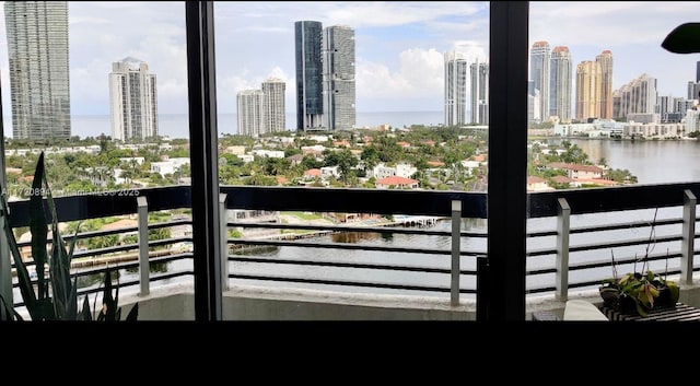 balcony featuring a water view