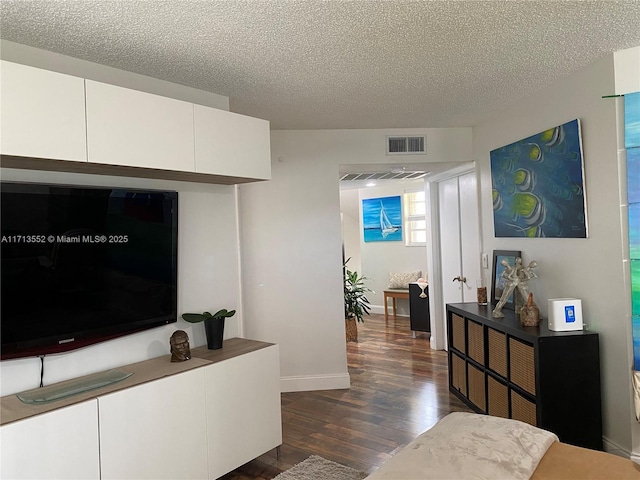2278 SE 27th Dr Unit 201-G, Homestead, FL 33035 - living room with dark hardwood / wood-style flooring and a textured ceiling