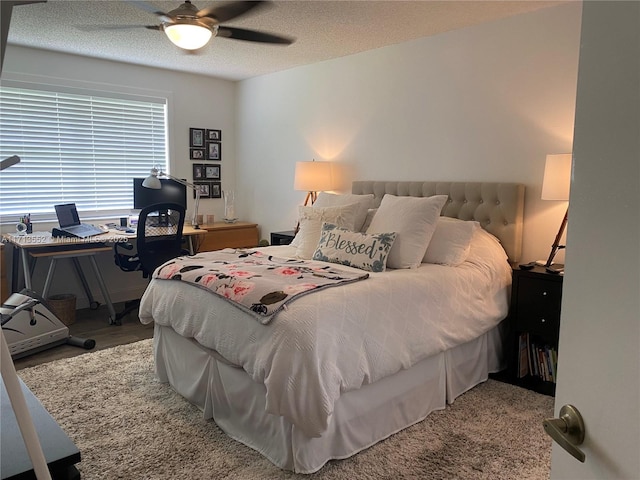 2278 SE 27th Dr Unit 201-G, Homestead, FL 33035 - bedroom with a textured ceiling and ceiling fan