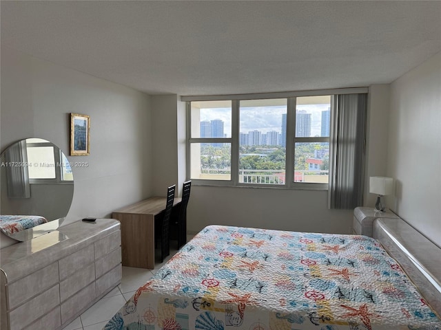 3180 S Ocean Dr Unit 721, Hallandale Beach, FL 33009 - bedroom featuring a view of city and light tile patterned floors
