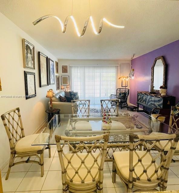 dining room with light tile patterned floors