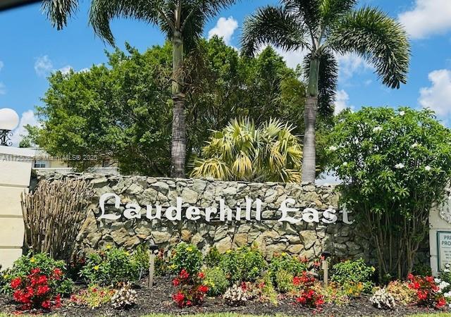 4441 NW 16th St Unit J311, Lauderhill, FL 33313 - view of community sign