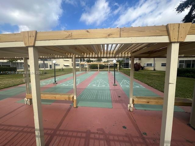 4441 NW 16th St Unit J311, Lauderhill, FL 33313 - surrounding community with a yard and shuffleboard