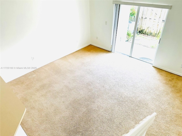 view of carpeted spare room