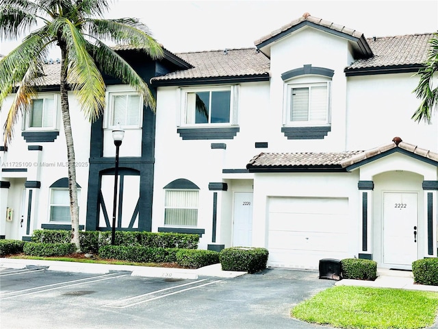 view of front of house with a garage