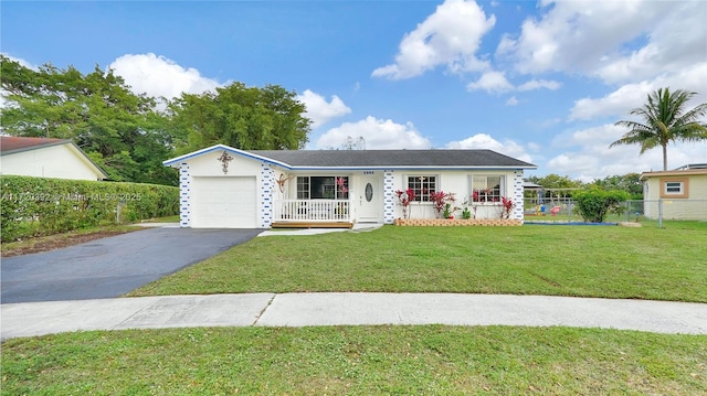 single story home with a front yard, a garage, and covered porch