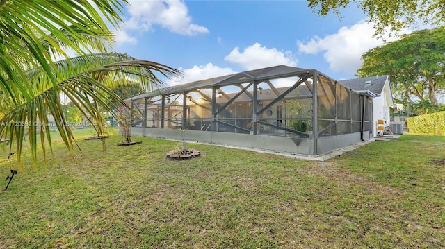 view of yard featuring a lanai