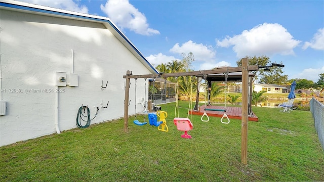 view of playground with a yard