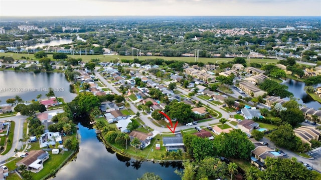 drone / aerial view featuring a water view