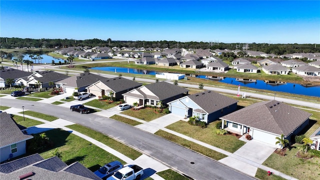 drone / aerial view featuring a water view