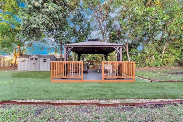 view of yard featuring a gazebo and a wooden deck