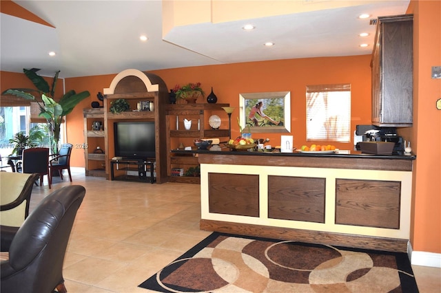 kitchen with light tile patterned flooring