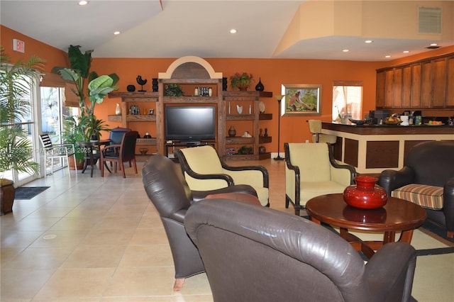 tiled living room featuring lofted ceiling