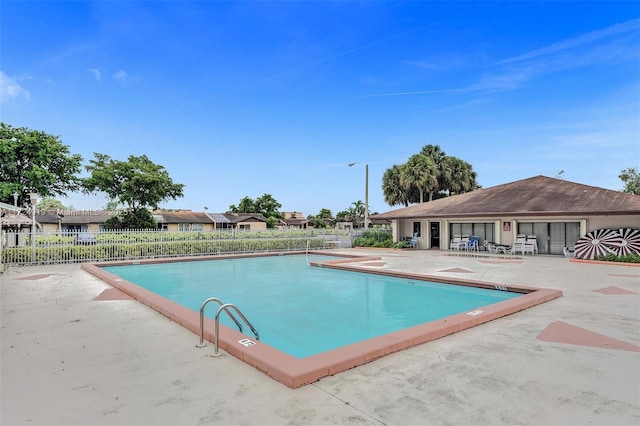 view of pool featuring a patio