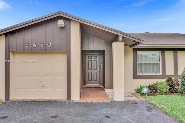 entrance to property with a garage