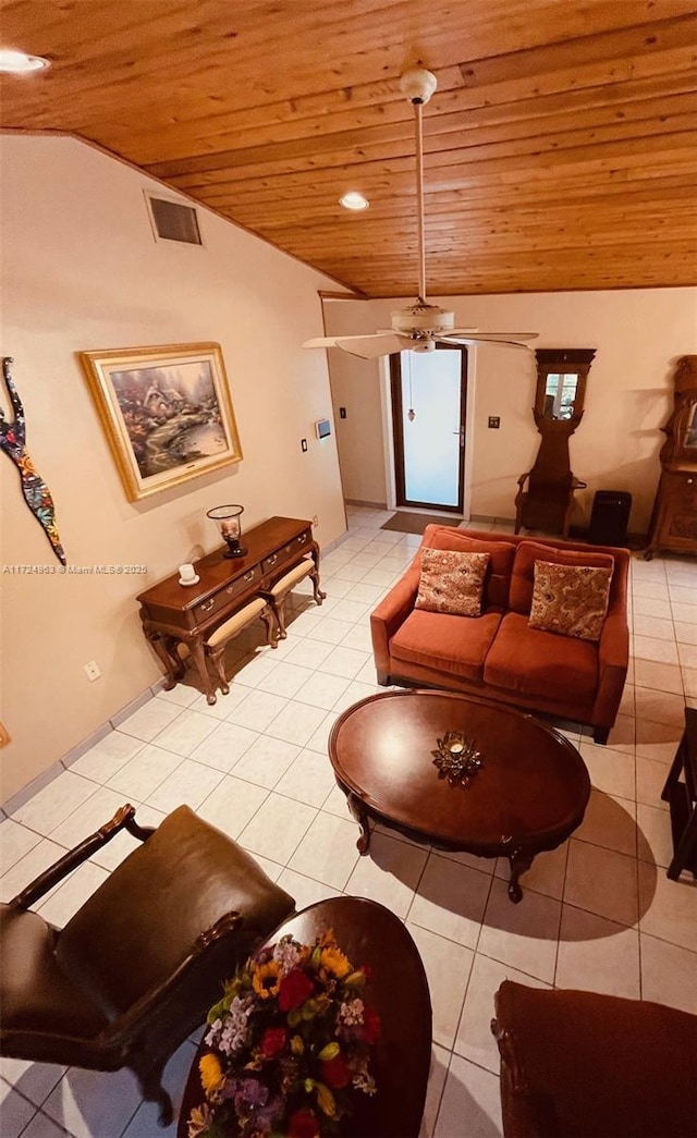 living room featuring ceiling fan, wooden ceiling, vaulted ceiling, and light tile patterned floors