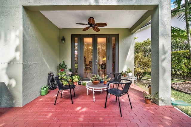 view of patio featuring french doors and ceiling fan