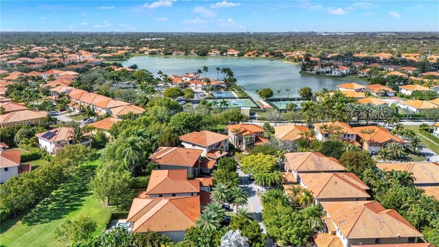 drone / aerial view with a water view