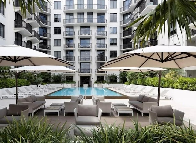 view of swimming pool with a patio area