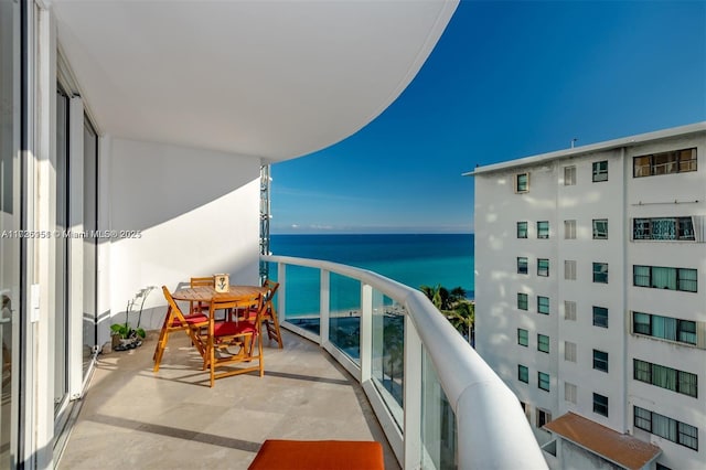 balcony featuring a water view