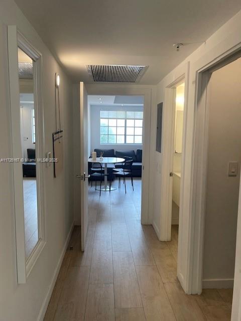 hallway featuring light wood-type flooring