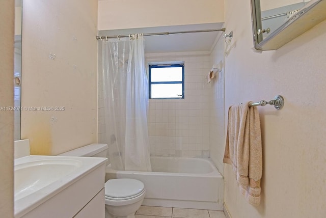 full bathroom featuring toilet, tile patterned flooring, vanity, and shower / tub combo with curtain