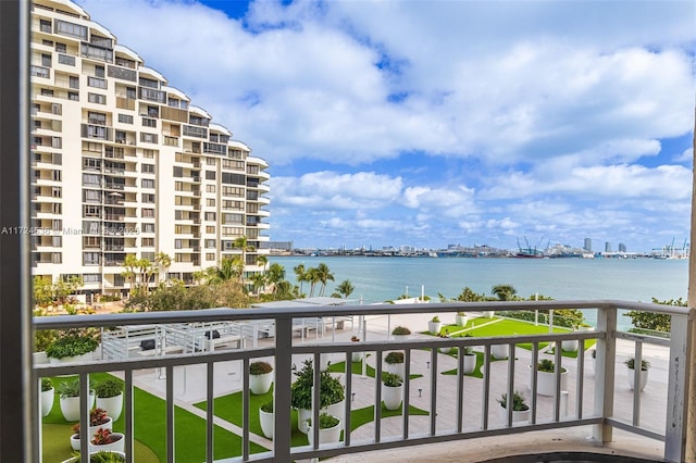 balcony featuring a water view