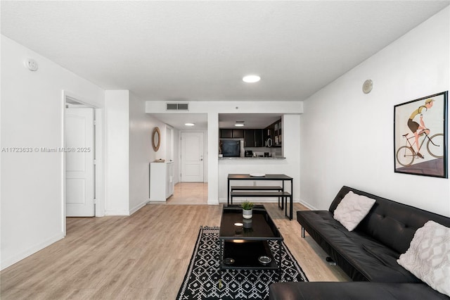 living room featuring light hardwood / wood-style floors