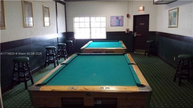 recreation room featuring pool table and dark colored carpet