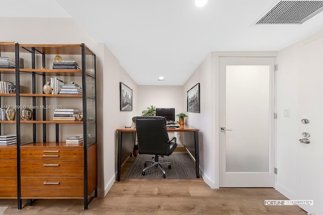 home office featuring light wood-type flooring