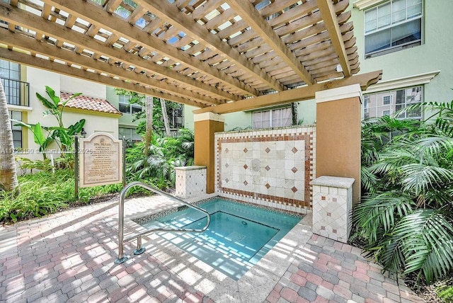 view of swimming pool with a pergola