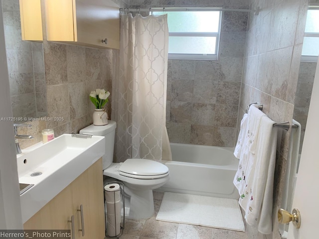 full bathroom with toilet, tile walls, backsplash, shower / bathtub combination with curtain, and vanity