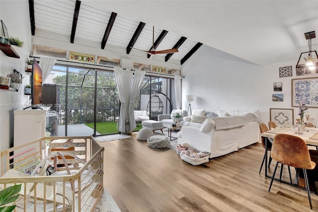 living room featuring light hardwood / wood-style floors, wood ceiling, high vaulted ceiling, and beamed ceiling