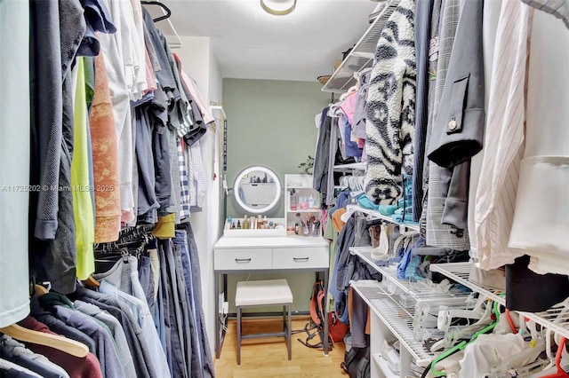 spacious closet with light wood-type flooring