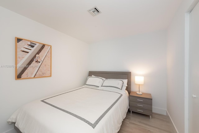 bedroom featuring light wood-type flooring