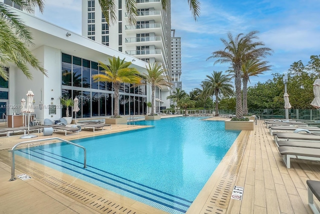 view of swimming pool featuring a patio area