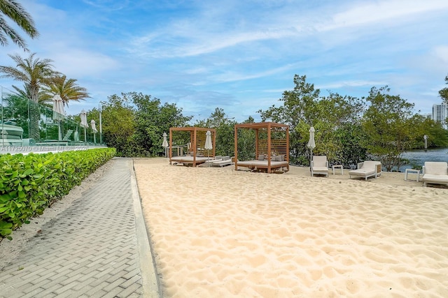 view of play area featuring a water view