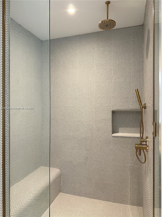 bathroom featuring walk in shower