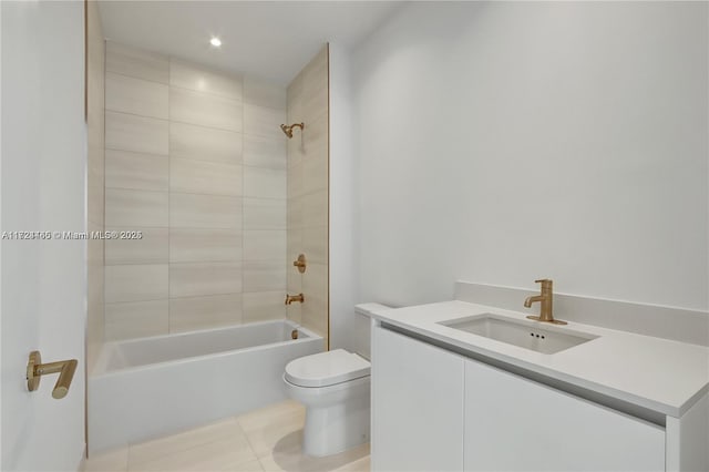 full bathroom featuring toilet, tiled shower / bath combo, tile patterned floors, and vanity