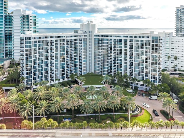 view of building exterior with a water view