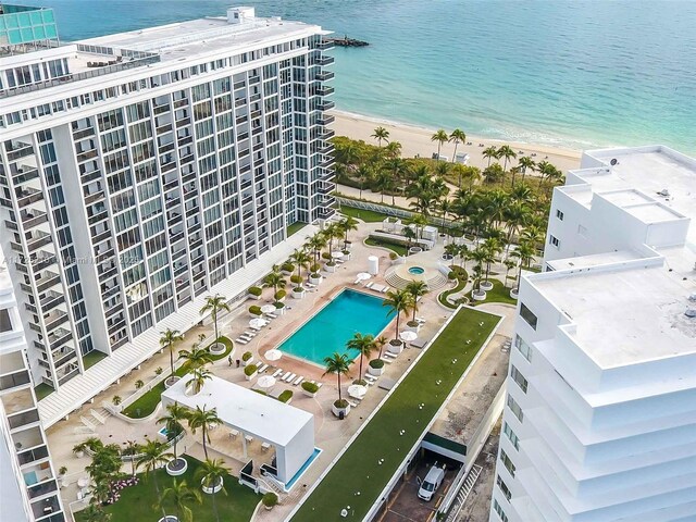 aerial view with a view of the beach and a water view