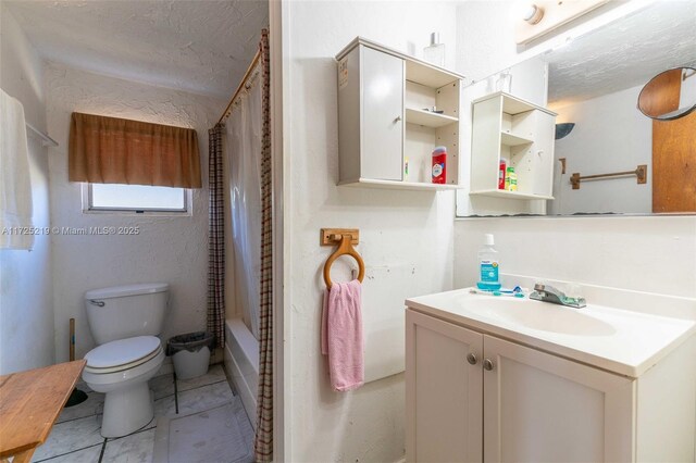 full bathroom with vanity, toilet, a textured ceiling, and shower / bath combo